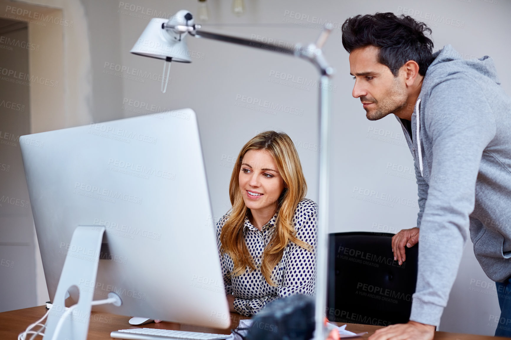 Buy stock photo Support, computer and creative team in office for project management, discussion and planning. People, conversation and collaboration with tech for campaign feedback, brainstorming or problem solving