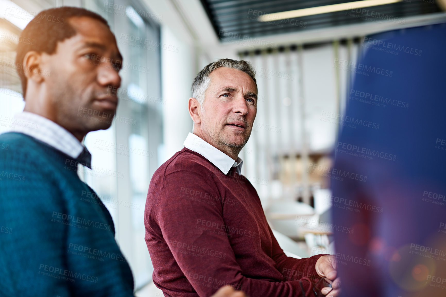 Buy stock photo Shot of a group of coworkers having a meeting in an office