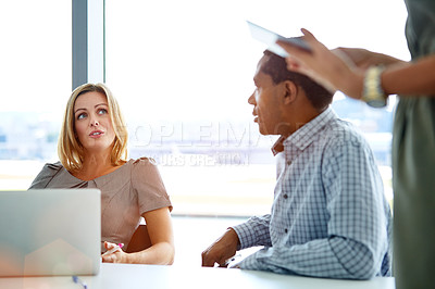 Buy stock photo Shot of a group of coworkers having a meeting in an office