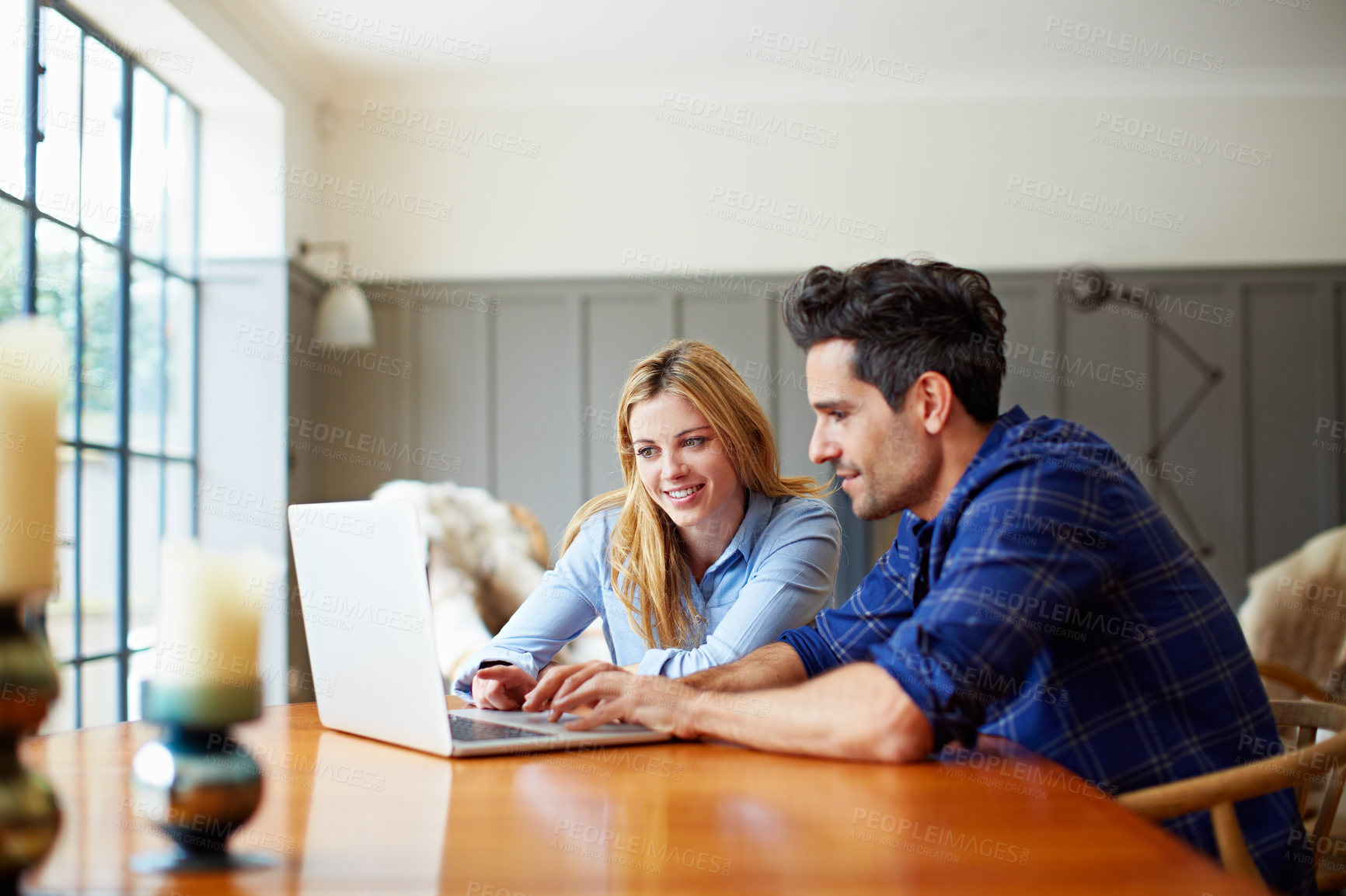 Buy stock photo Smile, couple and relax in home with laptop, social media and browsing website for latest movies. Happy, people and reading in lounge with pc, internet search and streaming online for film watchlist
