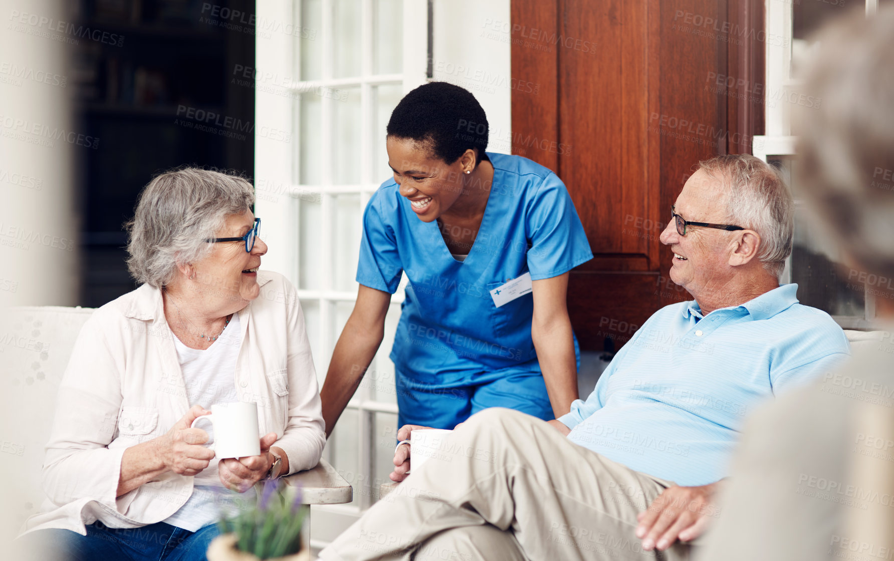 Buy stock photo Bonding, old people and nurse outdoor with chat, senior care and friendly conversation in backyard. Bokeh, elderly patient and caregiver with smile, connection and happy moment at retirement home.