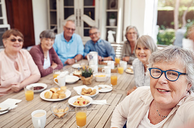 Buy stock photo Cropped portrait of a happy senior woman sitting with her friends and taking a selfie during a tea party