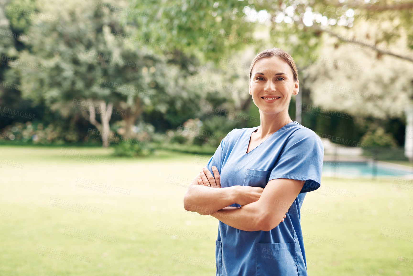 Buy stock photo Woman, portrait and nurse with confidence for medical aid, assisted living or health service. Female person, healthcare worker or caregiver with smile or arms crossed in garden for outdoor care