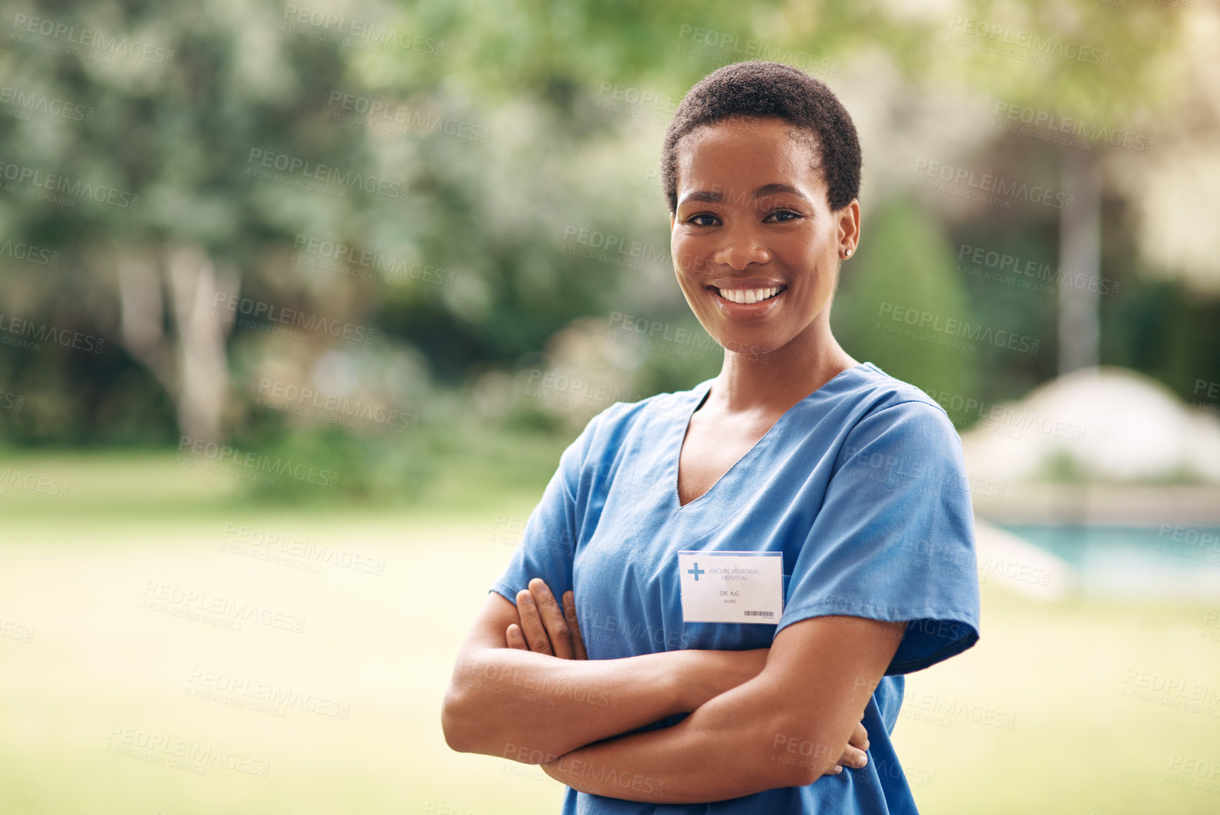 Buy stock photo Portrait, caregiver or black woman with smile for medical aid, assisted living or health service. Female person, healthcare worker or happy nurse with confidence or arms crossed in outdoor garden
