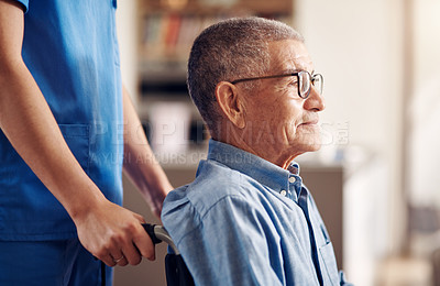 Buy stock photo Shot of a senior man in a wheelchair being cared for by a nurse at home