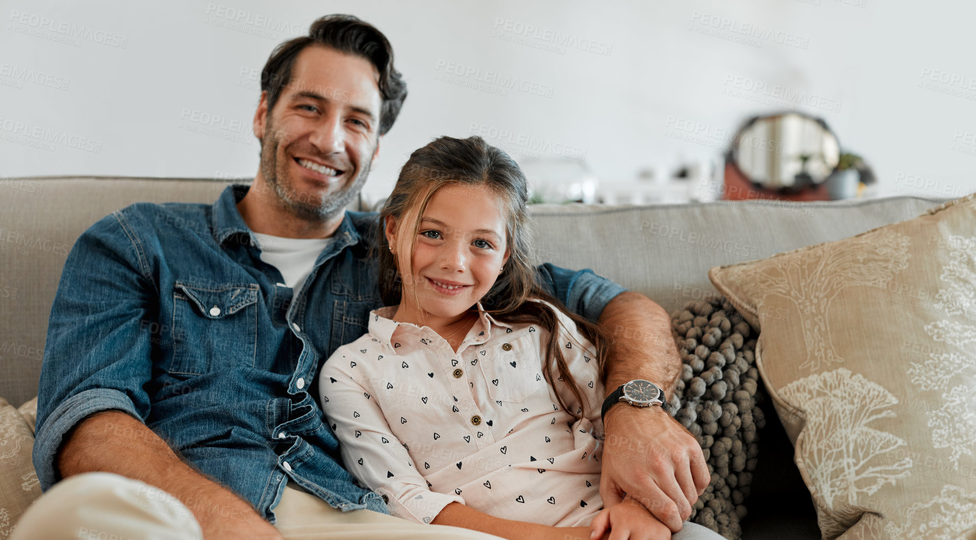 Buy stock photo Dad, portrait and relax with child in lounge, bonding and embrace with daughter on weekend in house. Family home, connection together and happy man with girl, love and chill with kid in living room