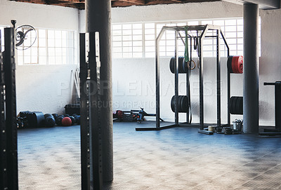 Buy stock photo Cropped shot of a fully-equipped gym with nobody in it