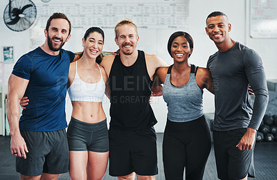 Buy stock photo Cropped portrait of a group of young athletes standing together in the gym