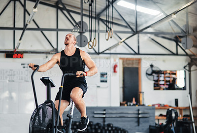 Buy stock photo Shot of a man doing cardio at the gym