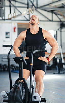 Buy stock photo Shot of a man doing cardio at the gym
