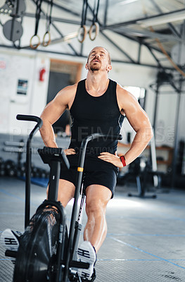Buy stock photo Shot of a man doing cardio at the gym