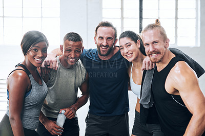 Buy stock photo Portrait of a group of young athletes standing together in the gym