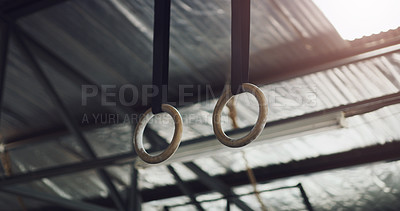 Buy stock photo Closeup shot of gymnastic rings in a gym