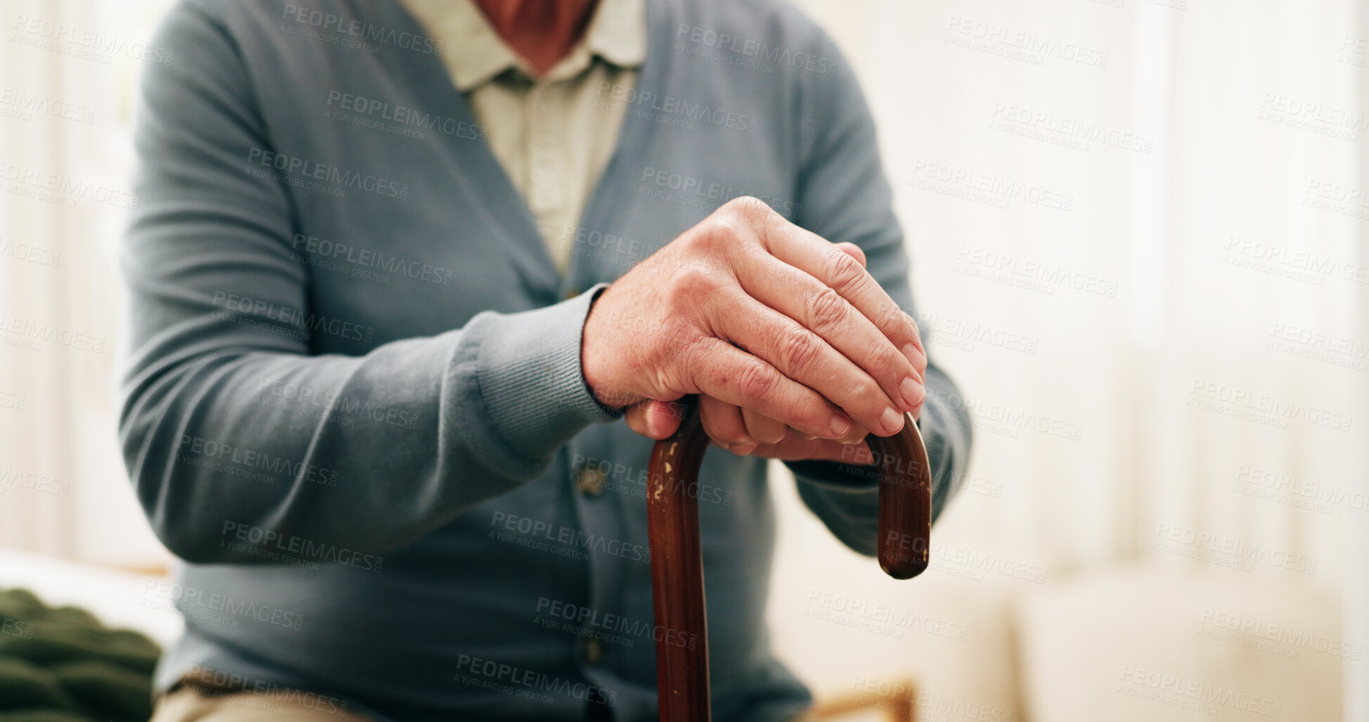 Buy stock photo Hands, cane and senior man in home for support, balance or wellness for arthritis recovery. Rehabilitation, walking stick and elderly person with a disability for mobility aid, help or assistance