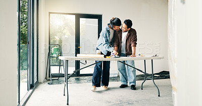 Buy stock photo DIY, home improvement and investment with couple at table for discussion or project planning. Conversation, real estate and renovation with people in new house for construction or interior design