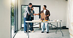 Designer, architect and handshake with partner in agreement, deal and planning at construction site. Happy people, team collaboration and shaking hands for onboarding, expansion or building success