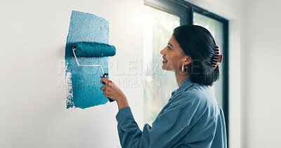 Buy stock photo Painting, woman and happy with wall renovation for living room makeover, home upgrade or maintenance. Interior design, homeowner and smile with paintbrush for house improvement, change and diy decor