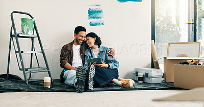 Buy stock photo Home improvement, hug and tablet with couple on floor for discussion or project planning. Conversation, investment and real estate app with people in new house for construction or interior design