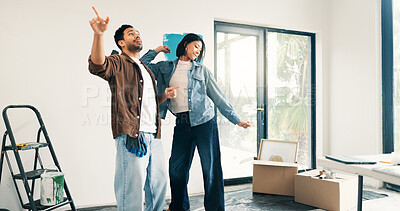 Buy stock photo Remodeling, fun or couple in lounge with dance, fresh start or happy moment in dream house. Property, renovation or people with playful groove, housing success or new homeowners in moving achievement