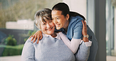 Buy stock photo Care, nurse and hug with senior woman for medical support, trust and connection together with smile. Portrait, happy caregiver and embrace person in retirement, assisted living and healthcare at home