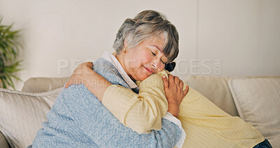 Buy stock photo Love, woman and hug with senior mother in home for care, support and bonding together. Adult daughter, comfort and embrace parent on couch with connection, affection and trust at family house