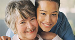 Senior, woman and portrait and hug with nurse for medical help or assisted living in home. Female people, healthcare worker or caregiver with patient, smile or embrace for elderly care in house