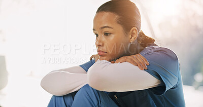 Buy stock photo Thinking, woman and nurse with stress for medical challenge, shift trauma and overwhelmed with loss. Anxiety, healthcare crisis and sad person with depression, grief or deep thoughts by clinic window