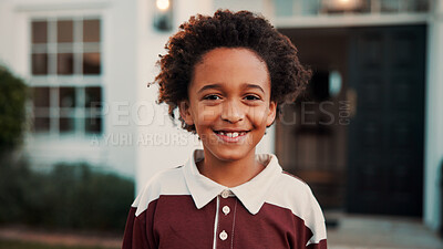 Buy stock photo New home, portrait and smile of boy outdoor in front yard for future, neighborhood or security. Property, real estate and relocation with happy black child in garden for fresh start or moving in