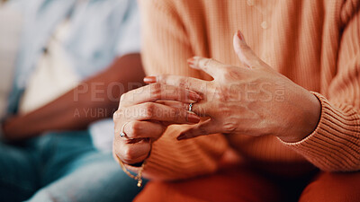 Buy stock photo Couple, hands and woman with ring for doubt, marriage mistake and regret in relationship. Man, wife and fidget with jewelry for commitment crisis, separation anxiety and divorce with partner