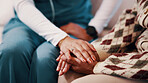 Holding hands, comfort and nurse with woman in home for support in medical diagnosis, advice or checkup. Healthcare, empathy and caregiver with patient for compassion at consultation in living room.