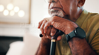 Buy stock photo Thinking, walking stick and hands of senior man in home with nostalgia, memory or remember. Cane, ideas and elderly person in living room with planning, decision or choice on retirement in house.