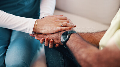 Buy stock photo Holding hands, empathy and nurse with man in home for support in medical diagnosis, advice or checkup. Healthcare, comfort and caregiver with patient for compassion at consultation in living room.