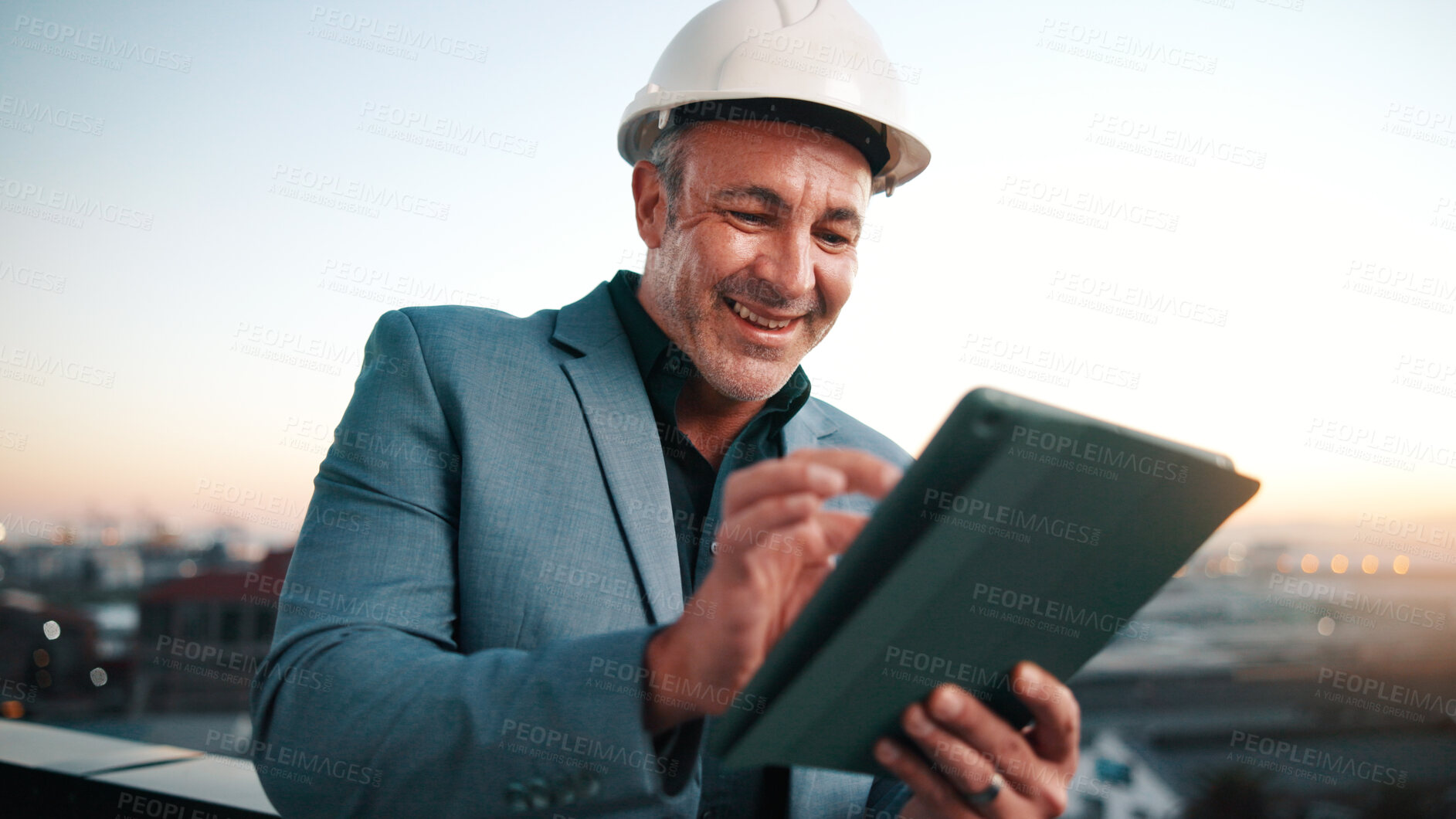 Buy stock photo Tablet, man and architect outdoor with sunset, inspector or engineering for urban infrastructure. Mature person, internet and smile on rooftop with tech, quality control and city construction