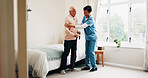Nurse, bed and senior patient with help in home for assisted living, healthcare or service. Female person, health worker or caregiver with man or cane in bedroom for elderly care, support or trust