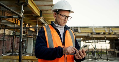 Buy stock photo Construction, text or man on site with phone, task instruction or inspection report in online chat. Typing, tech or mature engineer with reading, project brief or operations schedule on digital app.