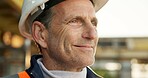 Thinking, man and engineer with smile for construction, inspection and vision for architecture. Happy, mature person or safety gear at site with reflection, quality assurance and building development