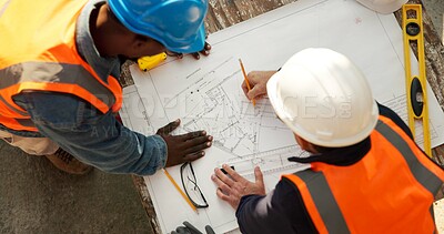 Buy stock photo Team, blueprint and engineer at construction site for planning, development review or layout above. Top view, people and document for architecture design, building discussion or drawing evaluation