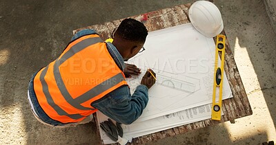 Buy stock photo Construction, above and man with drawing for blueprint outdoor, civil engineering or architecture with stationery. Architect, renovation or infrastructure upgrade with floor plan sketch on jobsite