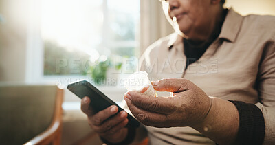 Buy stock photo Retirement, pills or hands in home with phone, care instruction or medication in health treatment. Medical, tech or senior woman with container, dosage research or prescription guidance for recovery.