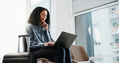Buy stock photo Businesswoman, travel or typing in airport with laptop, thinking and planning for overseas conference. Person, computer and waiting in terminal for departure, commute and research for work trip.