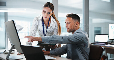 Buy stock photo Businessman, pointing and computer with coworker for analytics or performance review in office. Man, woman or showing colleague data with technology for company statistics or profit in workplace