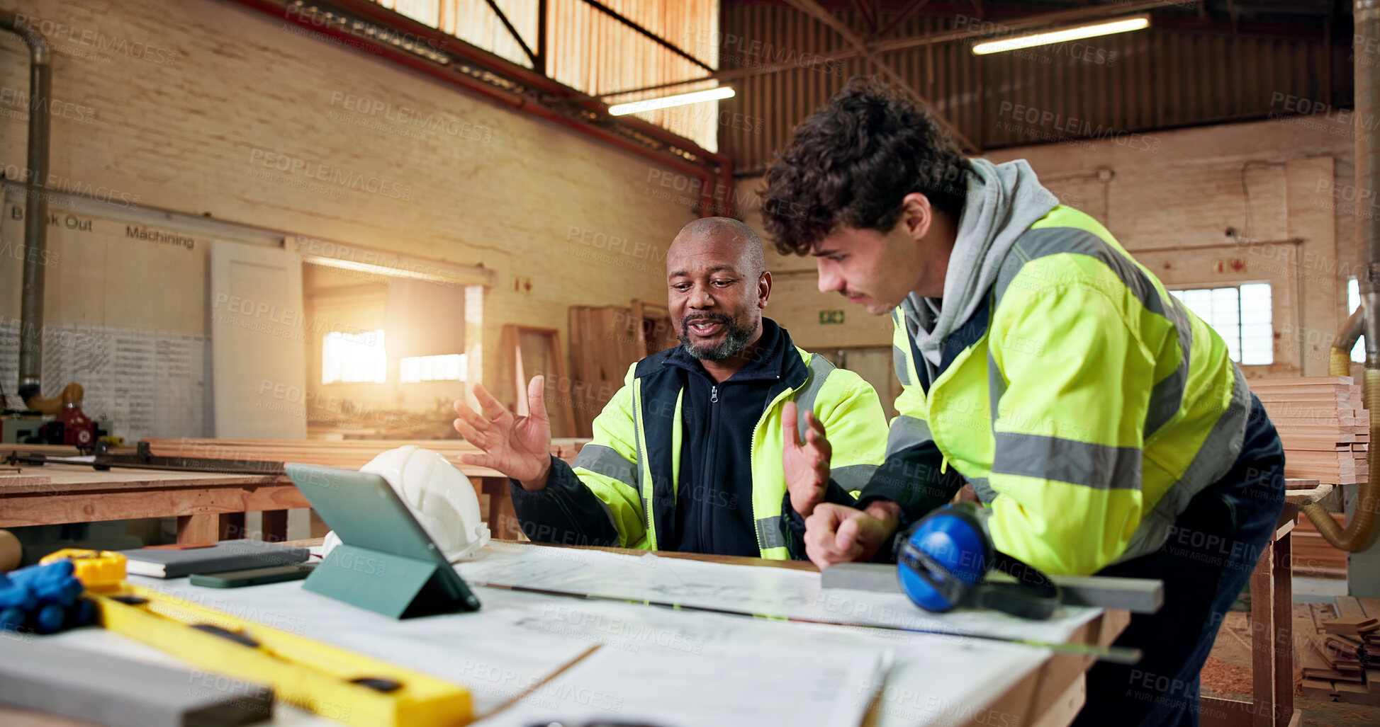 Buy stock photo Carpentry, planning and tablet with people in warehouse for engineer report, manufacturing and meeting. Woodworking project, collaboration and online schedule with employees in workshop for feedback