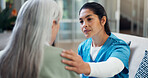 Caregiver, checkup and old woman at house for comfort, emotional support and medical diagnosis. Nurse, consoling and senior person in home with sympathy, compassion and treatment for terminal illness