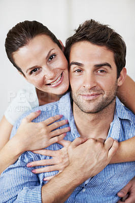 Buy stock photo Portrait, couple and hug at house with smile, love and partner support for bonding together. Happy, people and rest in lounge with embrace, admiration and marriage connection for healthy relationship