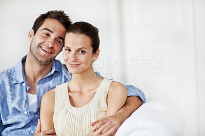 Buy stock photo Portrait, relax and smile with couple on sofa in home for bonding, support or weekend break. Happy, connection and commitment with man and woman in living room of house for marriage, space or loyalty