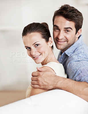 Buy stock photo Happy, couple and relax at house with portrait, love and affection for bonding together. Smile, people or rest in living room with embrace, admiration and marriage connection for healthy relationship