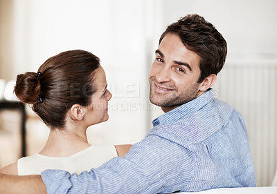Buy stock photo Smile, man and relax at house with woman, love and partner support for bonding together. Portrait, couple and rest in lounge with embrace, admiration and marriage connection for healthy relationship