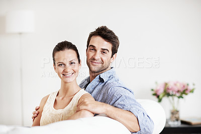Buy stock photo Love, portrait and loyalty with couple on sofa in home for bonding, support and weekend break. Happy, connection and commitment with man and woman in living room of house for marriage, care and relax