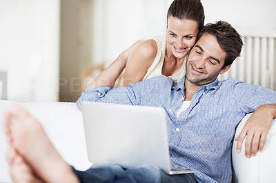 Buy stock photo Love, laptop and smile with couple on sofa in home for travel planning, partner and flight booking. Airline ticket, holiday budget and honeymoon research with happy man and woman in living room