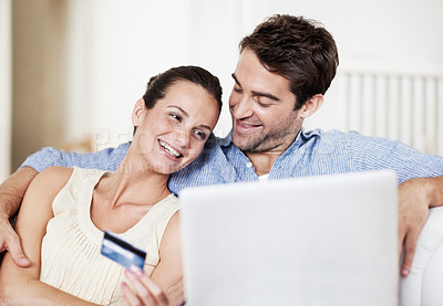 Buy stock photo Credit card, laptop and smile with couple on sofa in home for travel planning, payment and flight booking. Airline ticket, holiday budget and honeymoon cost with man and woman in living room